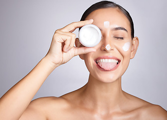 Image showing Beauty, container and funny woman face with cream for luxury healthcare, wellness routine or facial acne prevention. Spa salon, dermatology skincare or aesthetic self care model with collagen product