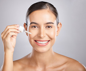 Image showing Beauty portrait, skincare or woman with serum for glowing skin hydration, anti aging or luxury facial protection. Happy aesthetic face of girl with liquid spa product, collagen oil or hyaluronic acid