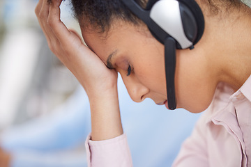 Image showing Call center, headache and woman with stress from telemarketing, customer service and communication burnout. Depression, anxiety and customer support employee tired from work in technical support