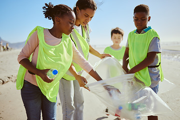 Image showing Diversity, beach cleaning and plastic recycling for teamwork, pollution ecology and environmental change collaboration. Eco friendly team, interracial people and ocean garbage recycle together