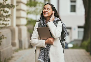 Image showing Travel, happy or woman listening to music and walking in London city on a relaxing holiday vacation or weekend. Smile, radio song or excited girl tourist looking at buildings and streaming podcast