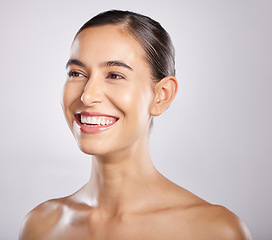 Image showing Woman, smile and happy thinking for beauty, skincare wellness and cosmetics dermatology in grey background studio. Model happiness, relax spa facial glow and positive mindset vision for body care.