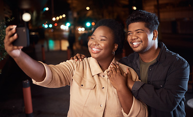 Image showing Couple of friends, phone or night selfie on city street or road for social media, profile picture or birthday celebration vlog. Smile, happy or bonding people on mobile photography technology in dark