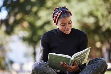 Image showing Black woman, reading book or nature park, garden or environment field in college, university or school study. Student, notebook or campus graduate with learning goals, education target or scholarship