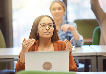 Image showing Business woman, laptop and audience opinion for idea at workshop training or seminar. Creative female employee with computer talking at convention for project plan or marketing startup at workplace