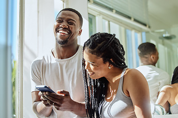 Image showing Phone, laughing and black couple in home on social media reading funny meme or joke. Relax comedy, cellphone and happy man and woman with mobile smartphone streaming or watching comic video online.