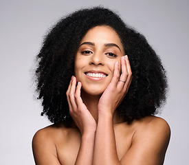 Image showing Beauty, skincare and product with portrait of black woman for facial, self care and luxury cosmetics. Spa, hair care and makeup with face of girl model for treatment, natural and wellness in studio