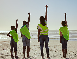 Image showing Back, activist and volunteer with friends on the beach for the conservation of the environment or sustainability. Charity, motivation and teamwork with a friend group cleaning or recycling for earth
