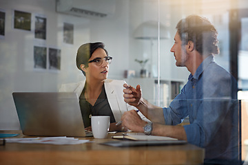 Image showing Training, planning and business people in a meeting for a partnership, discussion and brainstorming on a laptop. Teamwork, web design and employees talking about a plan for a website on a pc