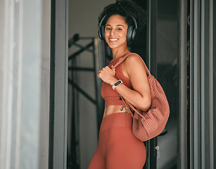 Image showing Fitness, headphones and black woman portrait happy about running, wellness and training. Music listening, health and sport athlete with a smile ready for exercise, sports and healthy body workout