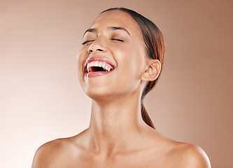 Image showing Skincare, woman or cosmetics for face detox, organic facial or laughing on studio background. Latino female, girl or makeup for wellness, healthcare or beauty treatment for smooth, clear or soft skin