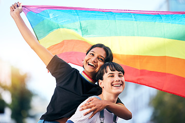 Image showing Love, lesbian and couple with pride, lgbtq and happiness for relationship, smile and rainbow flag. Women, friends and queer people bonding, loving and dating for romance, sexuality or gender equality