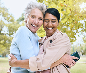 Image showing Senior women, bonding or hug portrait in nature park, garden or relax environment for social media, profile picture or memory. Smile, happy friends or retirement elderly embrace for mobile technology