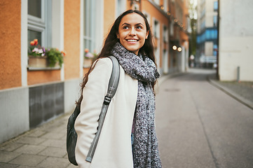 Image showing Thinking, happy and woman in the city for travel, street exploring and holiday in Argentina. Summer, traveling idea and girl walking in road with a smile during a vacation as a tourist an urban town