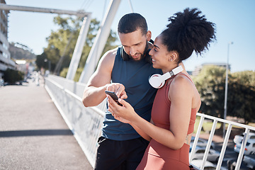 Image showing Exercise, fitness and black couple with phone in city for running, marathon training and workout on bridge. Love, sports and man and woman on smartphone for social media, music and health mobile app