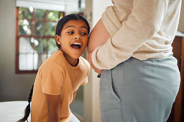 Image showing Pregnant, family and excited with a girl listening to the belly of her mother while bonding in the bedroom of their home. Kids, mom and pregnancy with a daughter hearing the stomach of her mama