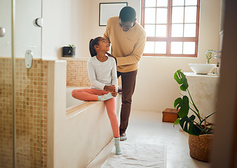 Image showing Black family, father and brushing hair of girl in a home bathroom with love and support. Man teaching child self care, health tips and wellness with communication, talking about trust and respect