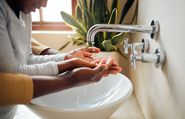 Image showing Cleaning hands zoom, people and hygiene in bathroom, disinfection and washing, self care with water for wash. Parent, child quality time together and clean hand, happy family with health and wellness