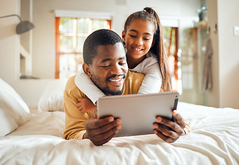 Image showing Black family, tablet or education with a father and daughter lying together on a bed in their home for learning. Relax, internet and kids with a man and girl in a bedroom for growth or development