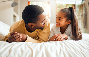 Image showing Family, father and girl child talking, spending quality time together with love and care, relax in bedroom at home. Black man, kid and happy people, communication and relationship with childhood