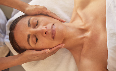 Image showing Woman, face and hands for massage in beauty salon for relax physical therapy, skincare wellness and luxury spa wellness. Masseuse, facial care and dermatology therapy for body care glow from above