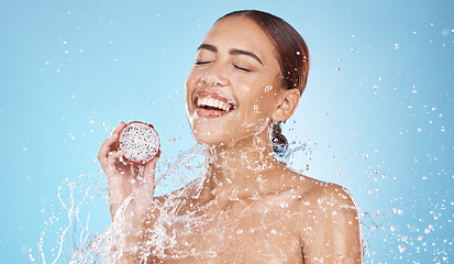 Image showing Beauty, skincare and woman with dragon fruit and water in studio for skincare products, cosmetics and spa. Wellness, detox and happy girl with fruit for natural, organic and healthy facial treatment