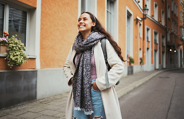 Image showing Excited, travel and walking woman in the city street for adventure, exploring and smile at architecture in France. Thinking, happy and girl on a walk in the road with an idea during a holiday