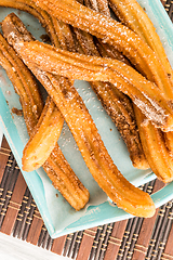 Image showing Traditional churros with hot chocolate 