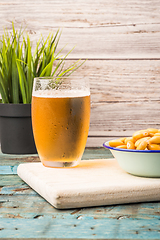 Image showing Tasty lupins and glass of beer