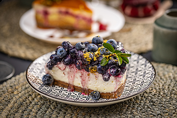 Image showing Cheesecake tart with fresh blueberries