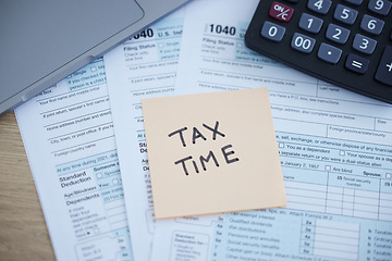 Image showing Tax time, accounting paperwork and form for government law compliance, file income revenue return or self assessment. Calculator, sticky note and finance audit form for financial payment and taxes