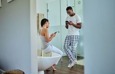 Image showing Social media, app and black couple on phone in the bathroom for news, website and chat. Communication, happy and African man and woman reading funny story on the internet on a mobile in the morning