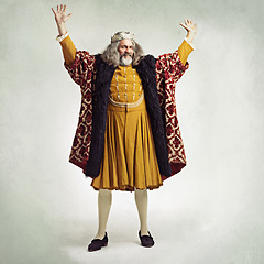 Image showing Royal king man, studio and hands in air for power, magic or winning celebration by gray background. Ancient medieval leader, portrait and full body with fantasy, happiness or vintage robe by backdrop