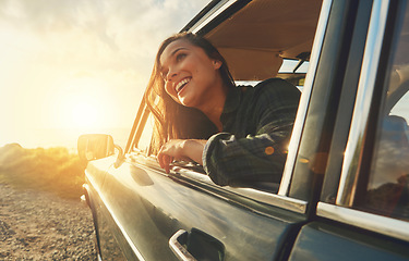 Image showing Thinking, travel and road trip with a black woman in a car at sunset during summer vacation or holiday. Nature, window and drive with an attractive young female sitting in transport for adventure