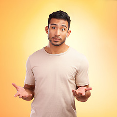 Image showing Man, confused and hands out isolated with questions and asking why on yellow background with mockup. Confusion, doubt and person from India with problem and frustrated hand gesture in studio portrait