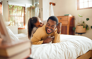 Image showing Happy, relax and father and daughter in bedroom playing for bonding, support and affectionate. Smile, happiness and laugh with dad and child on bed in family home for care, quality time and playful