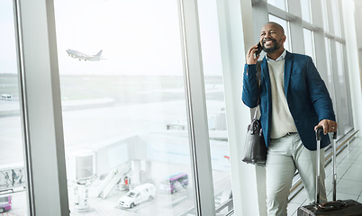 Image showing Businessman, phone call and luggage waiting at airport for travel, work trip or plain journey to country. Happy black man, employee or person with smile for communication before flight on smartphone