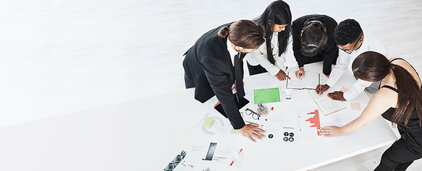 Image showing Meeting, finance and planning with a business team working around a table in the boardroom from above. Accounting, documents and teamwork with a man and woman employee group at work in an office