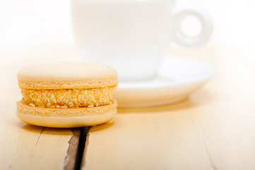 Image showing colorful macaroons with espresso coffee