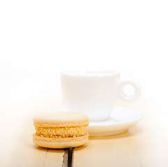 Image showing colorful macaroons with espresso coffee