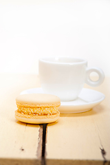 Image showing colorful macaroons with espresso coffee