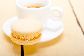 Image showing colorful macaroons with espresso coffee