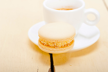 Image showing colorful macaroons with espresso coffee