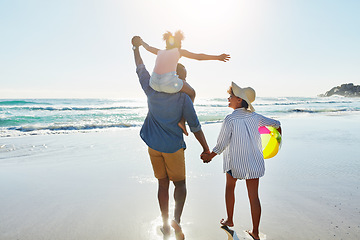 Image showing Walking black family, beach and back of people holding hands, parents and child enjoy fun outdoor quality time together. Ocean sea water, freedom peace and youth kid, father and mother in Jamaica