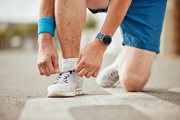 Image showing Runner, fitness or hands tie shoes to start training, cardio workout or sports exercise in city road. Legs, man or healthy sports athlete with running shoes or footwear laces ready for body goals