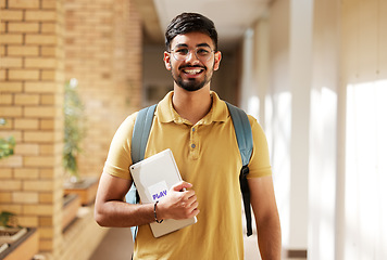 Image showing Face portrait, student and man in university ready for back to school learning, goals or targets. Scholarship, education and happy, confident and proud male from India holding tablet for studying.