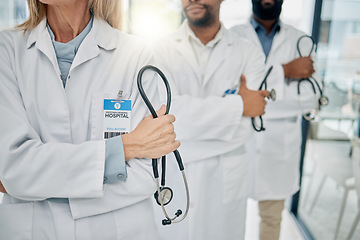 Image showing Healthcare, team and hands of doctors with stethoscope for trust, support and insurance in hospital. Teamwork, leadership and group of medical workers with tools for medicine, wellness and cardiology