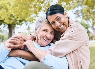 Image showing Couple of friends, senior or portrait hug in nature park, garden or relax environment in retirement support or trust. Smile, happy or laughing elderly women in bonding embrace in community backyard