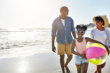 Image showing Black family, mockup or beach with a mother, father and daughter carrying a ball while walking on the sand by the sea. Love, children and ocean with a man, woman and girl child on the coast in summer