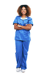 Image showing Happy, smiling and portrait of a black woman with arms crossed isolated on a white background in studio. Medical expert, healthcare and African nurse with a smile, pride and confidence for surgery